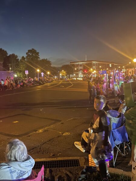 People line the streets in front of the Hershey Theatre and the downtown square. The parade started at 7 P.M., but didn’t reach the end of the route until 8 P.M. (Broadcaster/ Natalie Colarossi).