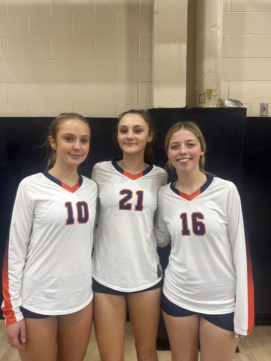 Seniors Zoey Hess, Carson McCormick, and Tayen Parke pose for a picture. The HHS girls volleyball team won 3-1 against Mifflin County. (The Broadcaster/Ishmarika Adhikari and Jessica Wang)

