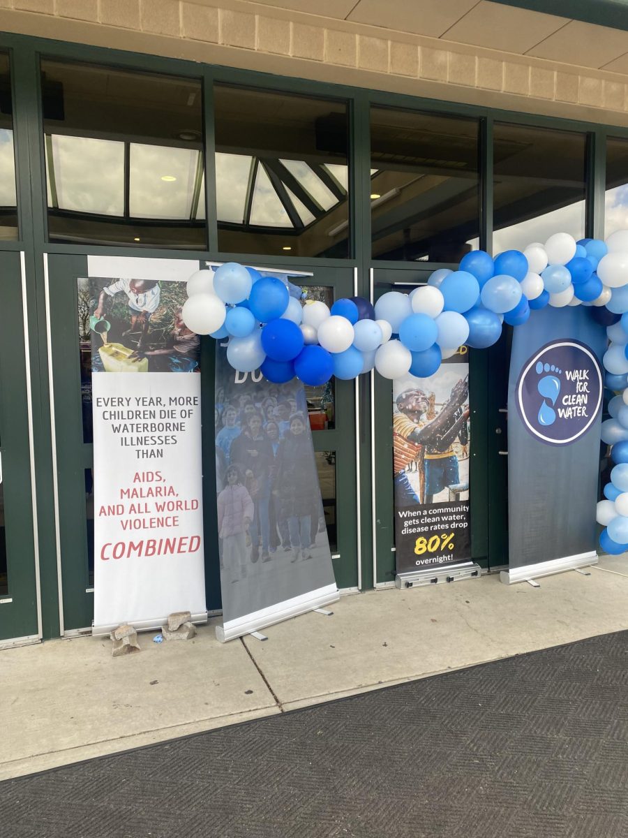 The sign in front of the high school’s main entrance to support the event. The posters presented concerning facts about the clean water crisis. (Tabitha Pecchio/The Broadcaster)
