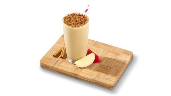 Tropical Smoothie’s Apple Pie Paradise Smoothie with Biscoff cookies presented with apple slices and a cinnamon stick on the side. This drink is on the menu for a limited time only. (Tropical Smoothie Cafe)