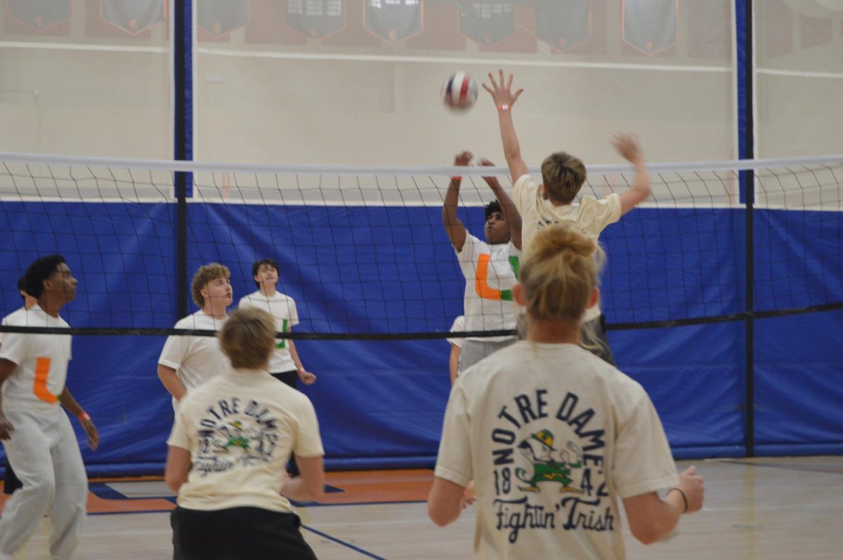 Notre Dome player hitting the ball back to U Miami. Notre Dome won 16-8.