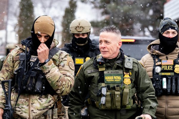 Former ICE commander, Greg Borzino, leads his troops through Minneapolis during a protest. Borzino was let go of his position after a protester was killed by an ICE agent under his command. (Chad Davis/ CC BY 4.0)
