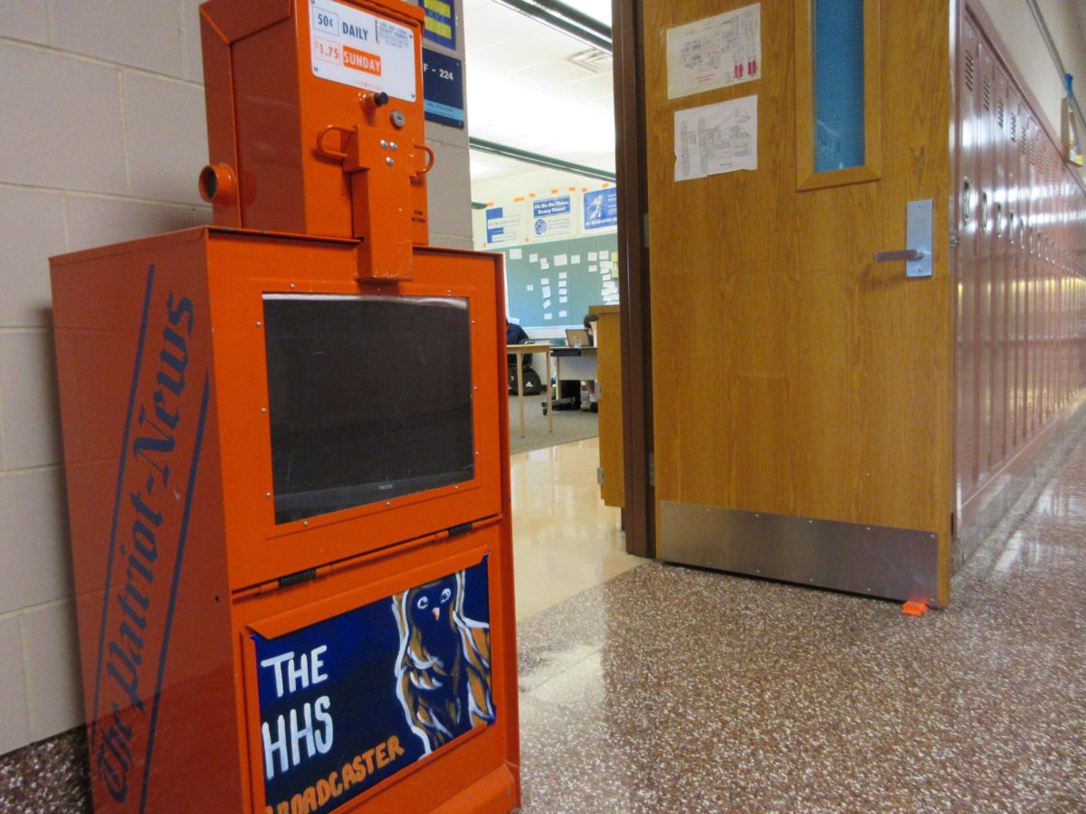 A donated Patriot News newspaper vending machine sits outside of Robert Sterner’s journalism classroom on May 8, 2026. This year, the Broadcaster celebrated its 100th anniversary as the school paper. (Broadcaster/Millicent Godoy)